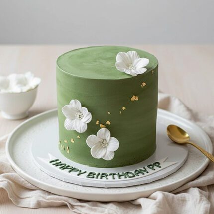 Elegant green buttercream birthday cake