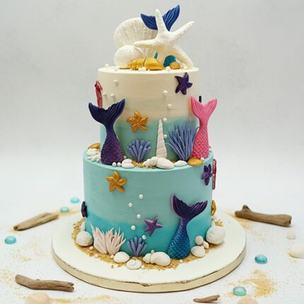 Mermaid 2  tier themed cake.jpg